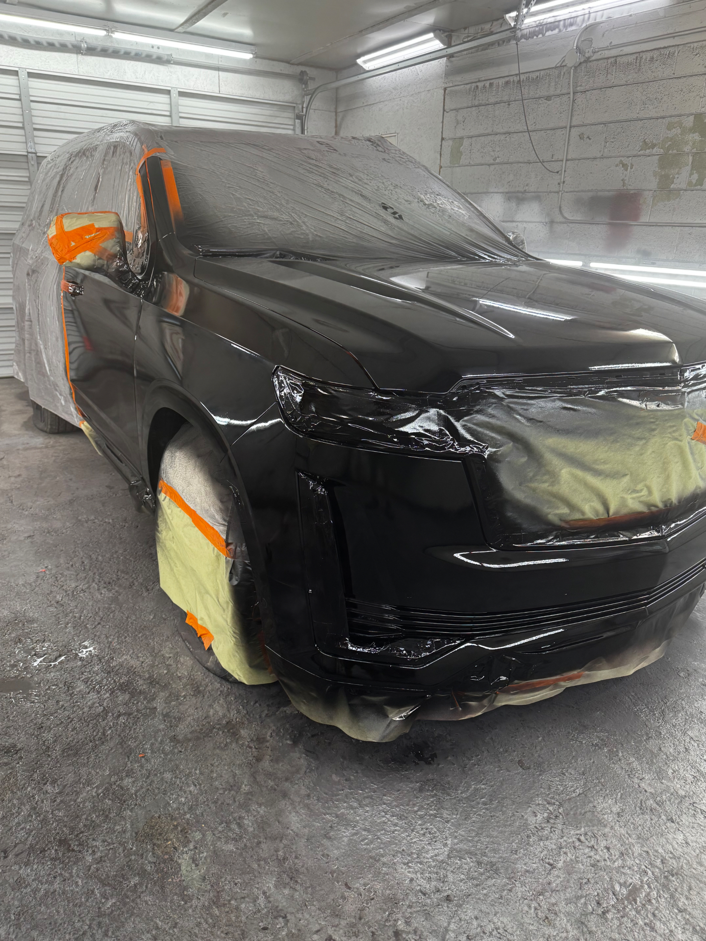 Cadillac Escalade front end finished, after body repair